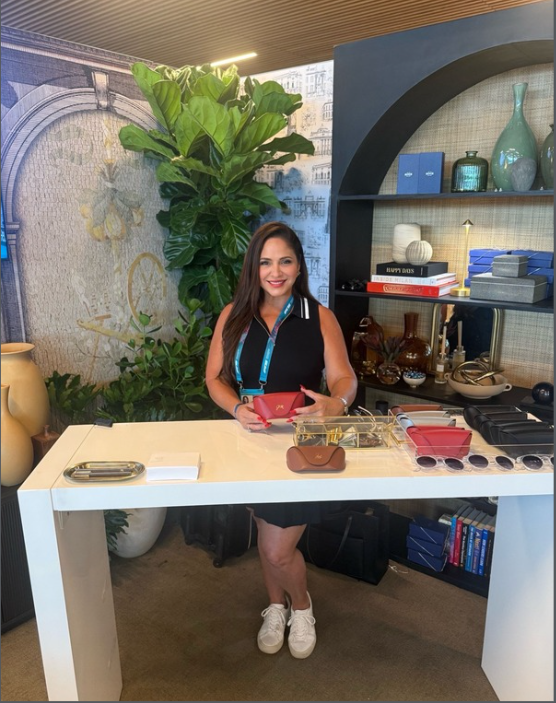 Live calligraphy and engraving station inside the Formula 1 Paddock Club in Miami